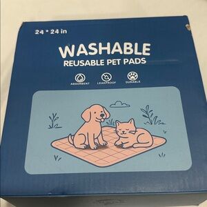 Washable reusable pee pads new in the box you get two of them 24 x 24”